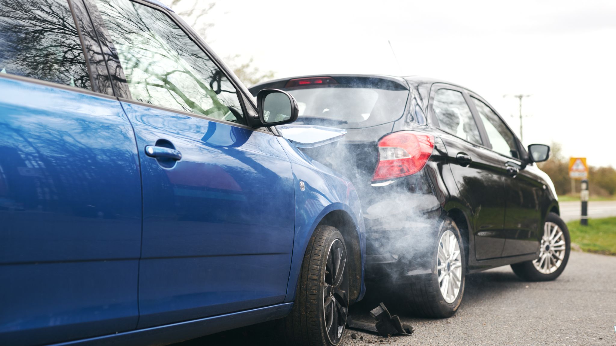 Driver checking car insurance rate online